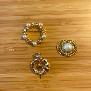 Gold tone brooches